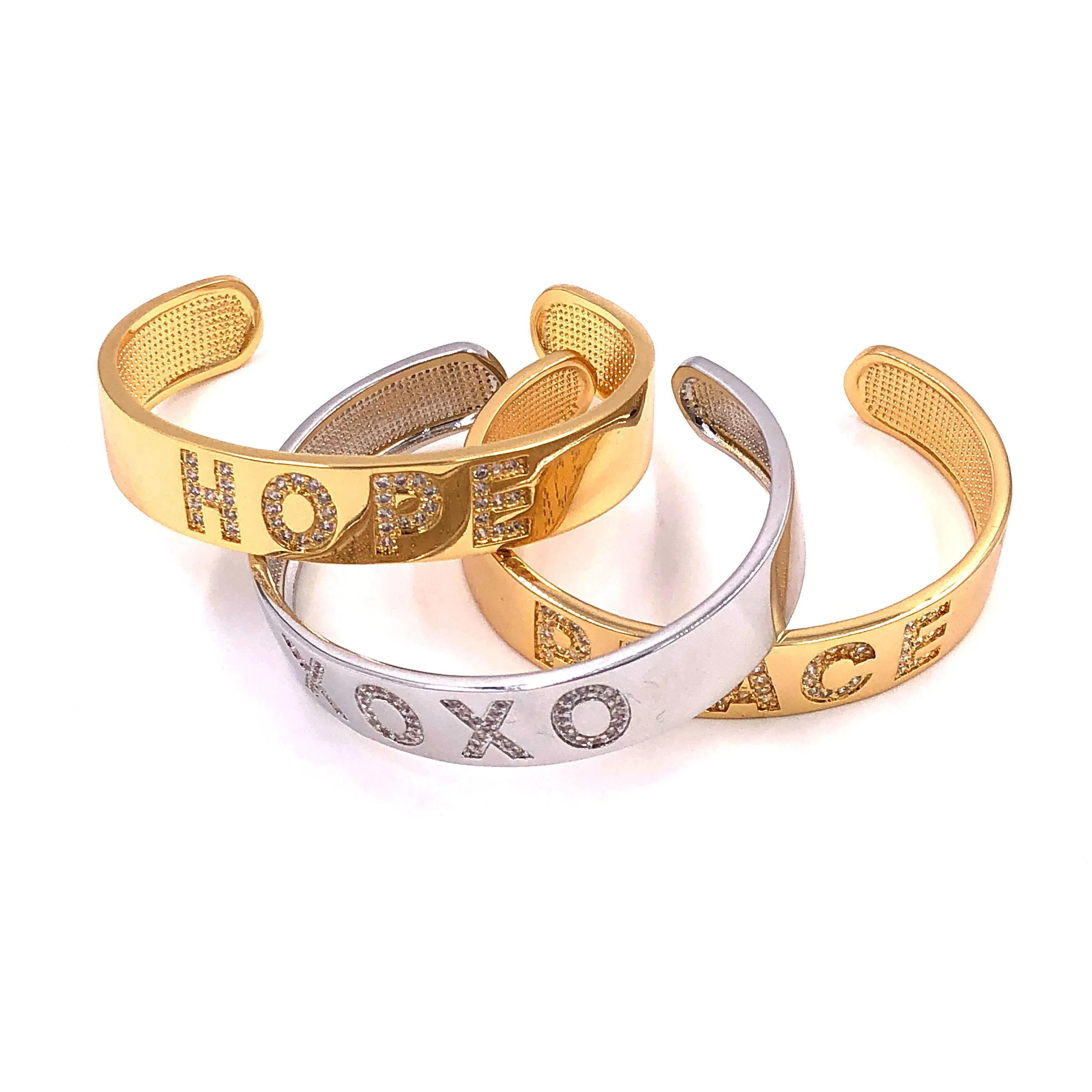 Ashley Gold Stainless Steel Cuff With CZ's And Slogan