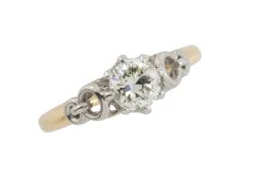 Diamond solitaire ring in platinum and gold