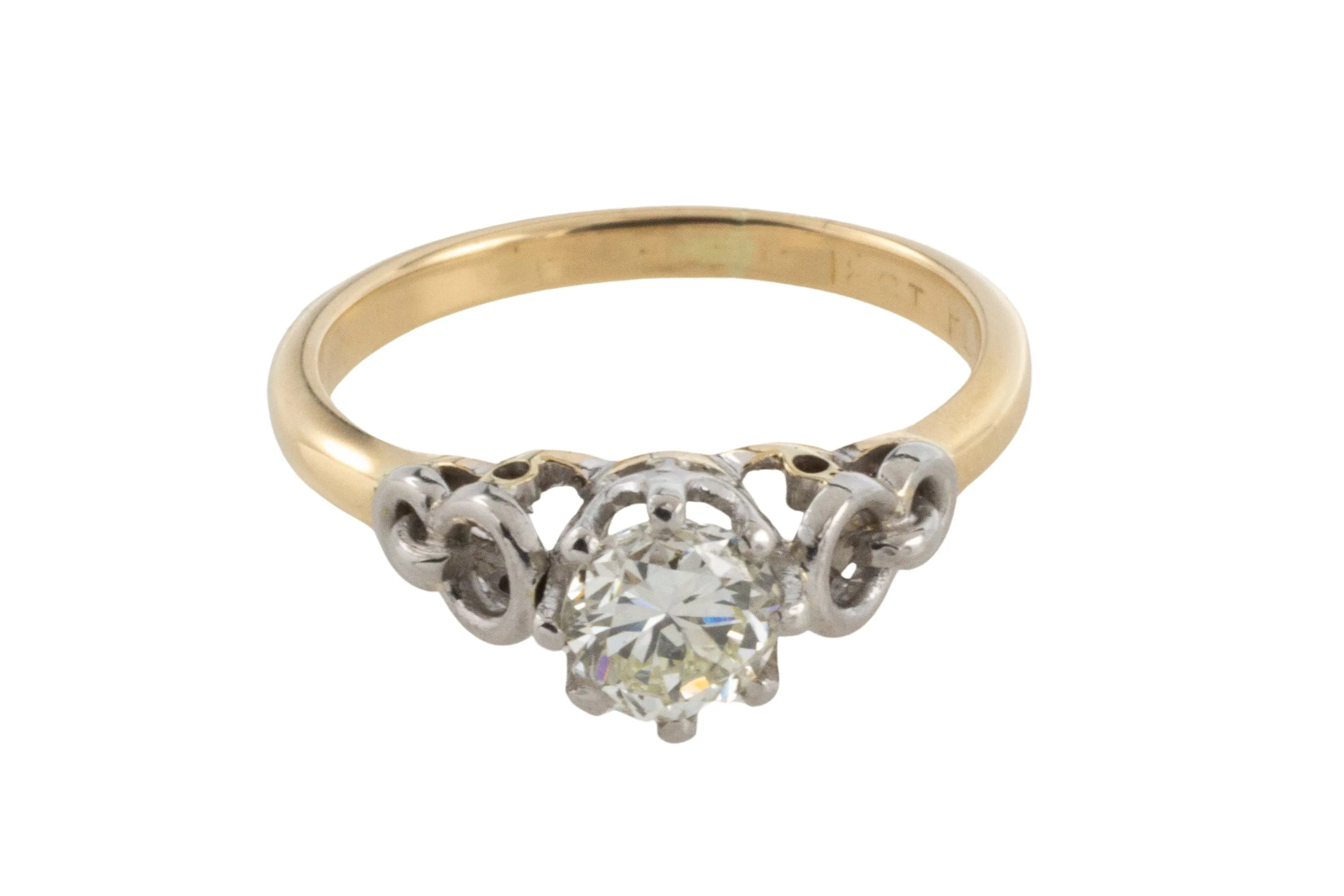 Diamond solitaire ring in platinum and gold