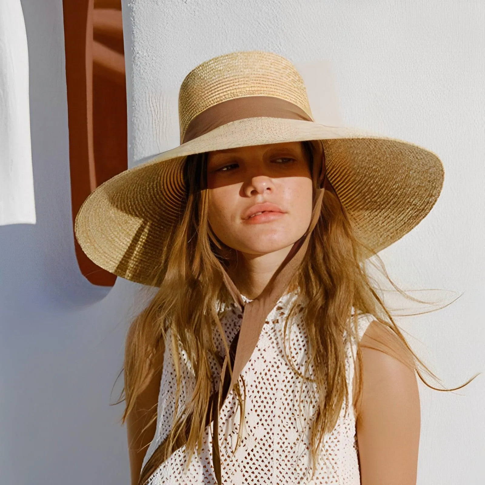 Elegant Wide Brim Straw Hat with Adjustable Neck Tie