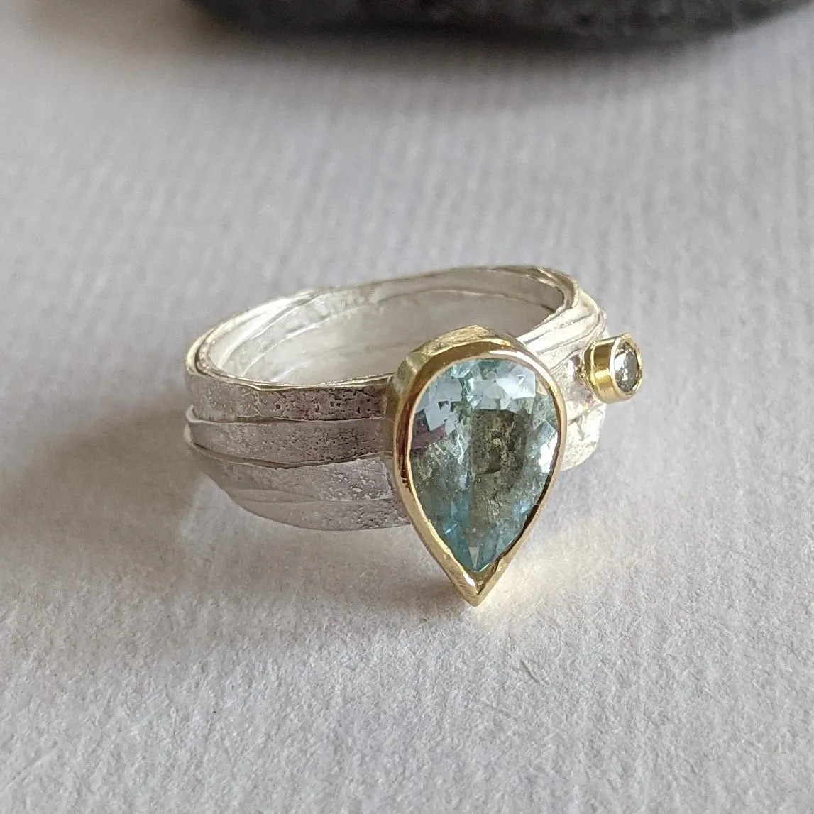 Gold and Silver Wrap Ring with Round Diamond and Pear Shape Moss Aquamarine