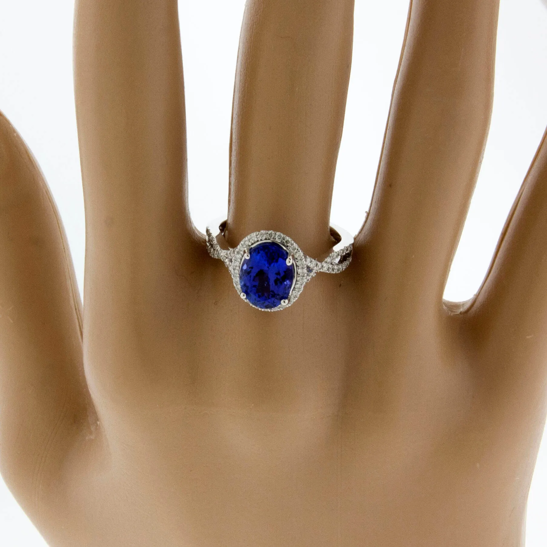 Oval Tanzanite & Diamond Halo Split Shank Ring