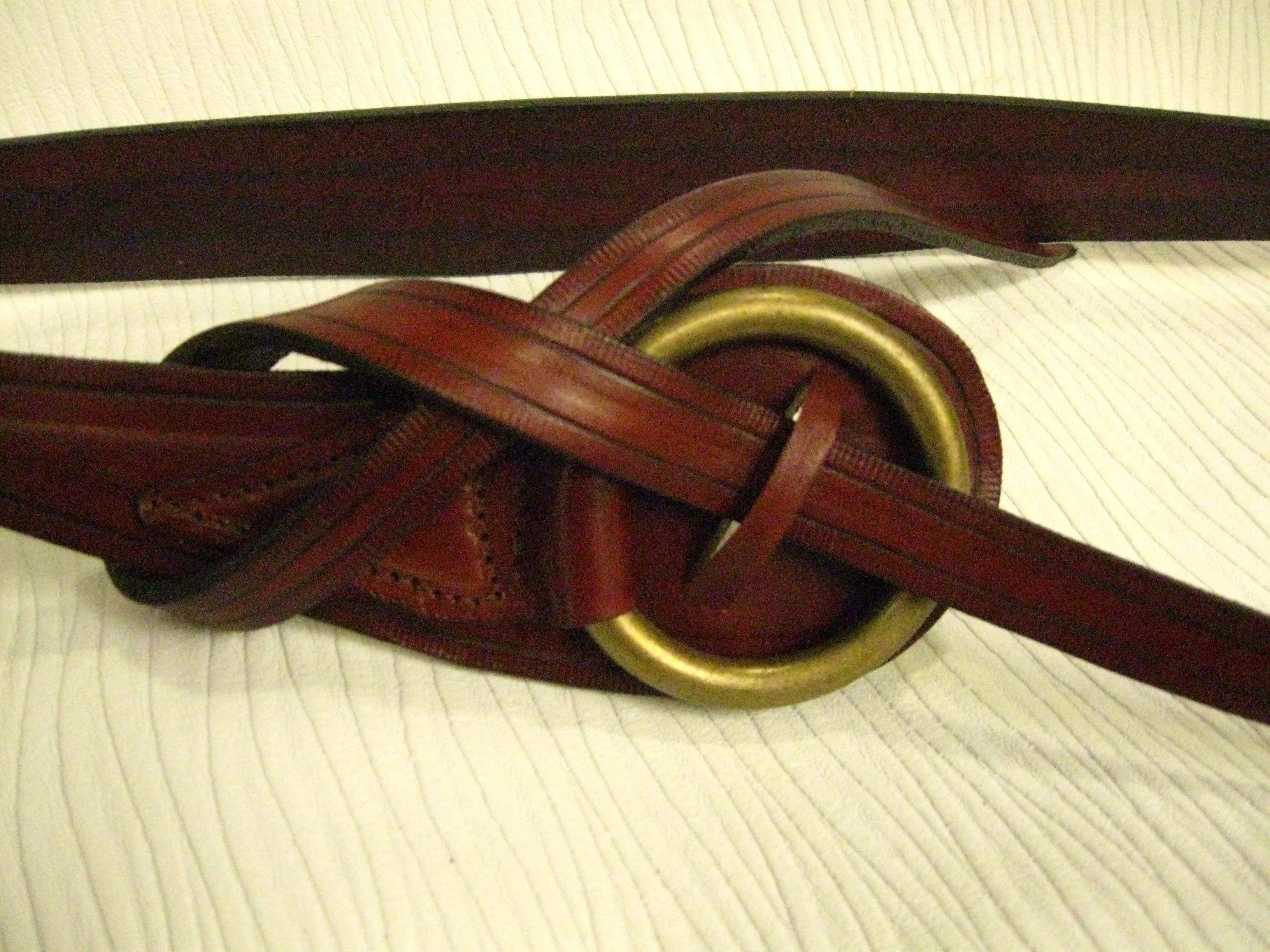 Woman's over the skirt, dress or sweeter leather belt with brass ring