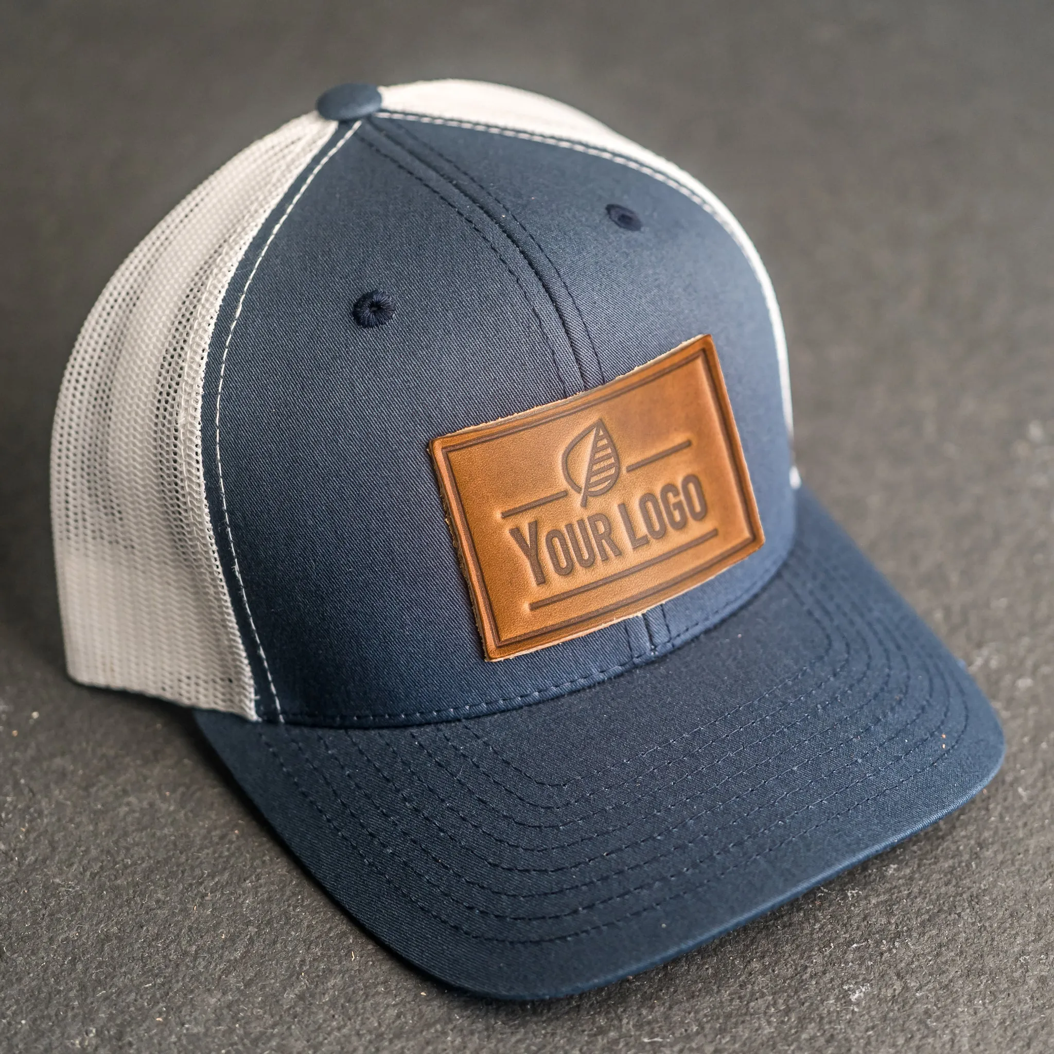 Your Logo on a Leather Patch Trucker Style Hat