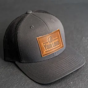 Your Logo on a Leather Patch Trucker Style Hat