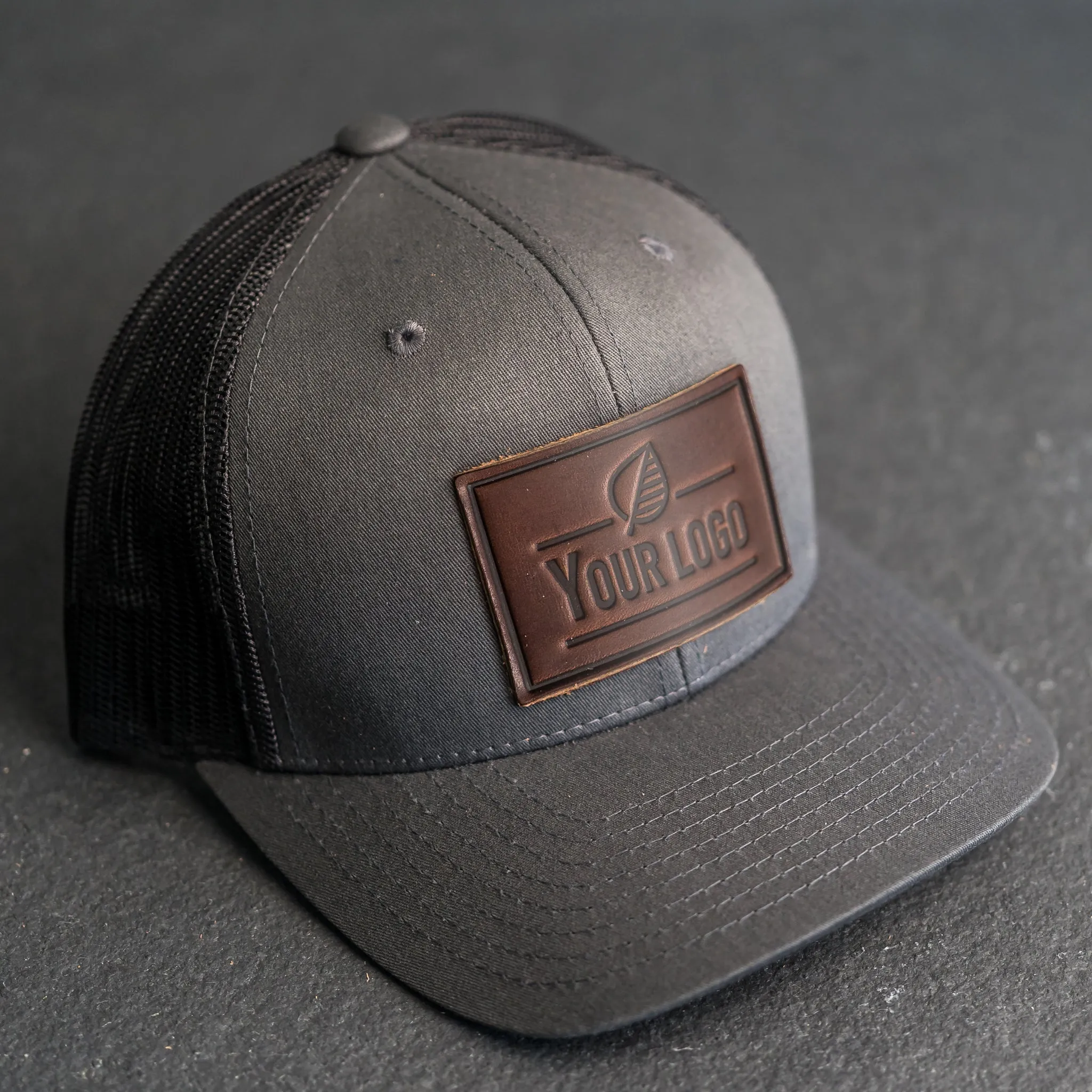 Your Logo on a Leather Patch Trucker Style Hat